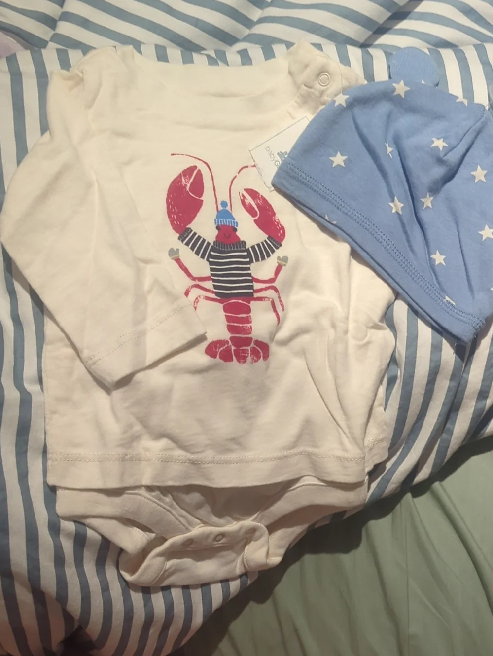 Cream Baby Bodysuit with Red Lobster Graphic and Light Blue Star Hat